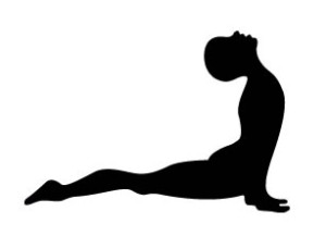 Silhouette of person in yoga pose.